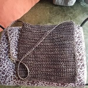 Brown purse straw shoulder strap